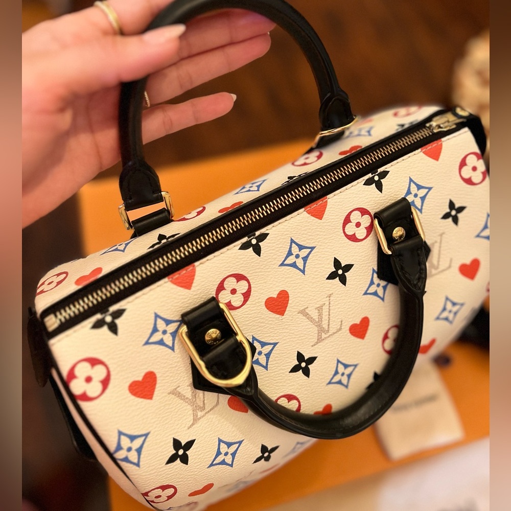 LOUIS VUITTON Speedy Bandouliere 25 Game On bag with strap. Monogram multicolor.